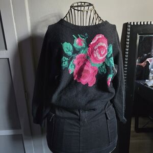 Chic Black Sweater with Pink Floral Design